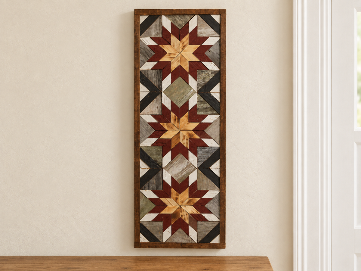 Amish handmade barn quilt banner with colorful geometric pattern, measuring 10.5 x 30 inches, displayed on a wooden fence.