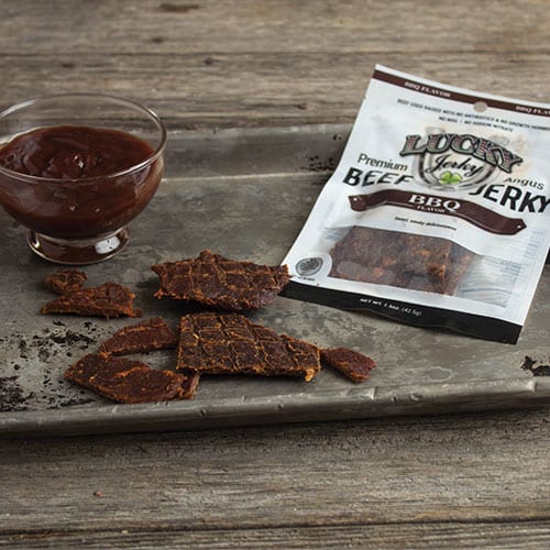 Smoked BBQ beef jerky in a 1.5 oz package from Nebraska Star Beef, showcasing tender, flavorful beef jerky with a smoky glaze.