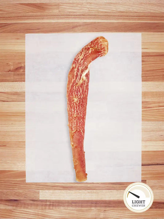 Farm Hounds beef aorta chews, natural dog treats made from beef aorta, shown in the image with textured, chewy dog treat pieces.