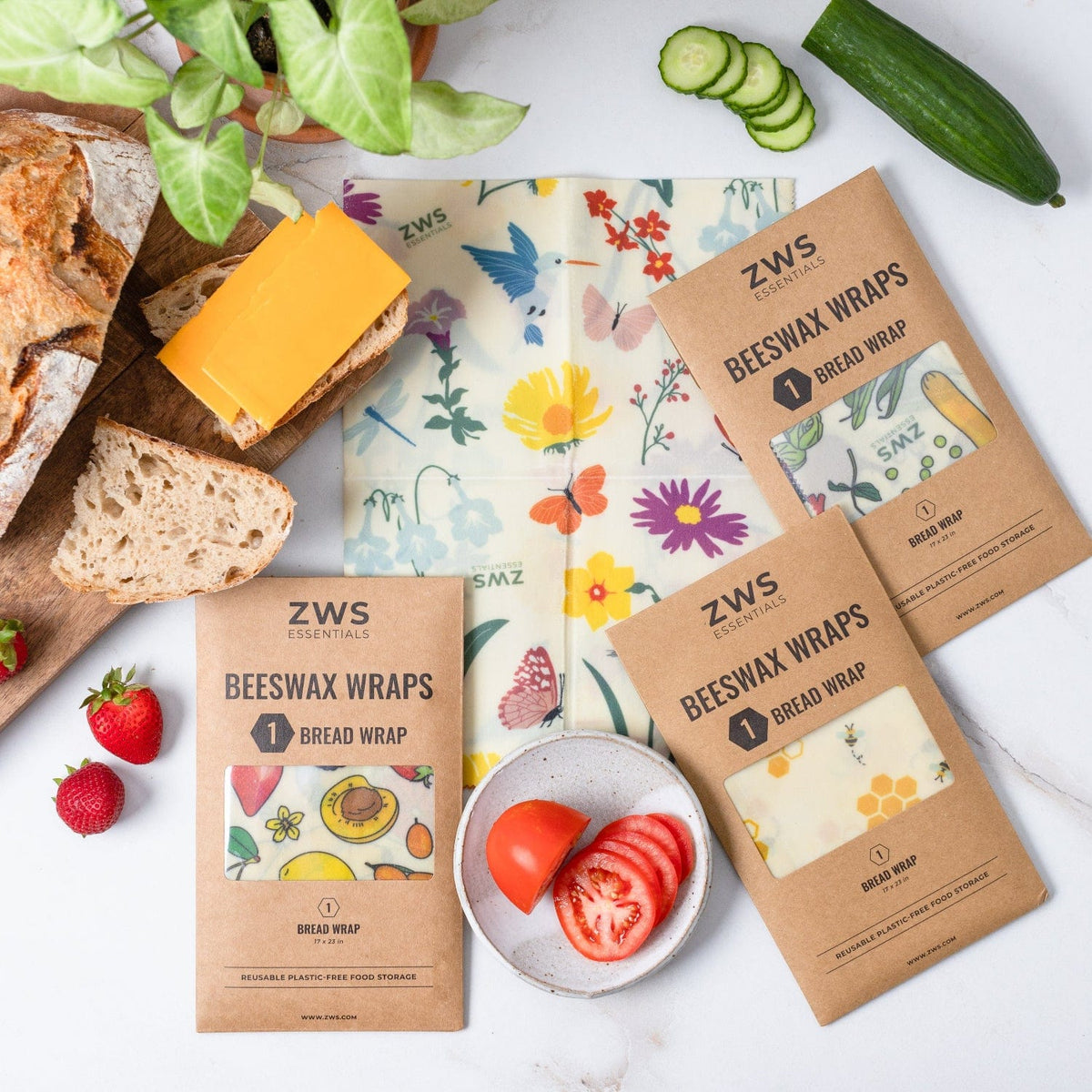 Set of beeswax wraps by ZeroWasteStore.com for bread and food storage, featuring natural beeswax-coated cloths in various sizes.