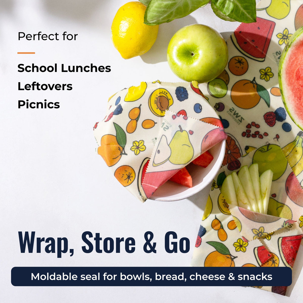 Colorful beeswax food wraps with fruit pattern from ZeroWasteStore.com, eco-friendly plastic-free food storage solution.