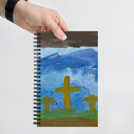 Watercolor spiral notebook with "He is Not Here" design from Blessings Grow Meadows, ideal for note-taking and journaling.