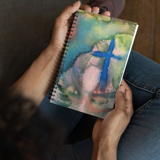 Watercolor cross spiral notebook with original artwork from Blessings Grow Meadows, ideal for writing and note-taking.