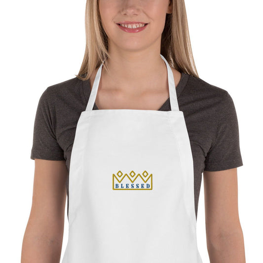Embroidered apron by Blessings Grow Meadows featuring "Blessed with Crowns" custom design and intricate crown embroidery.