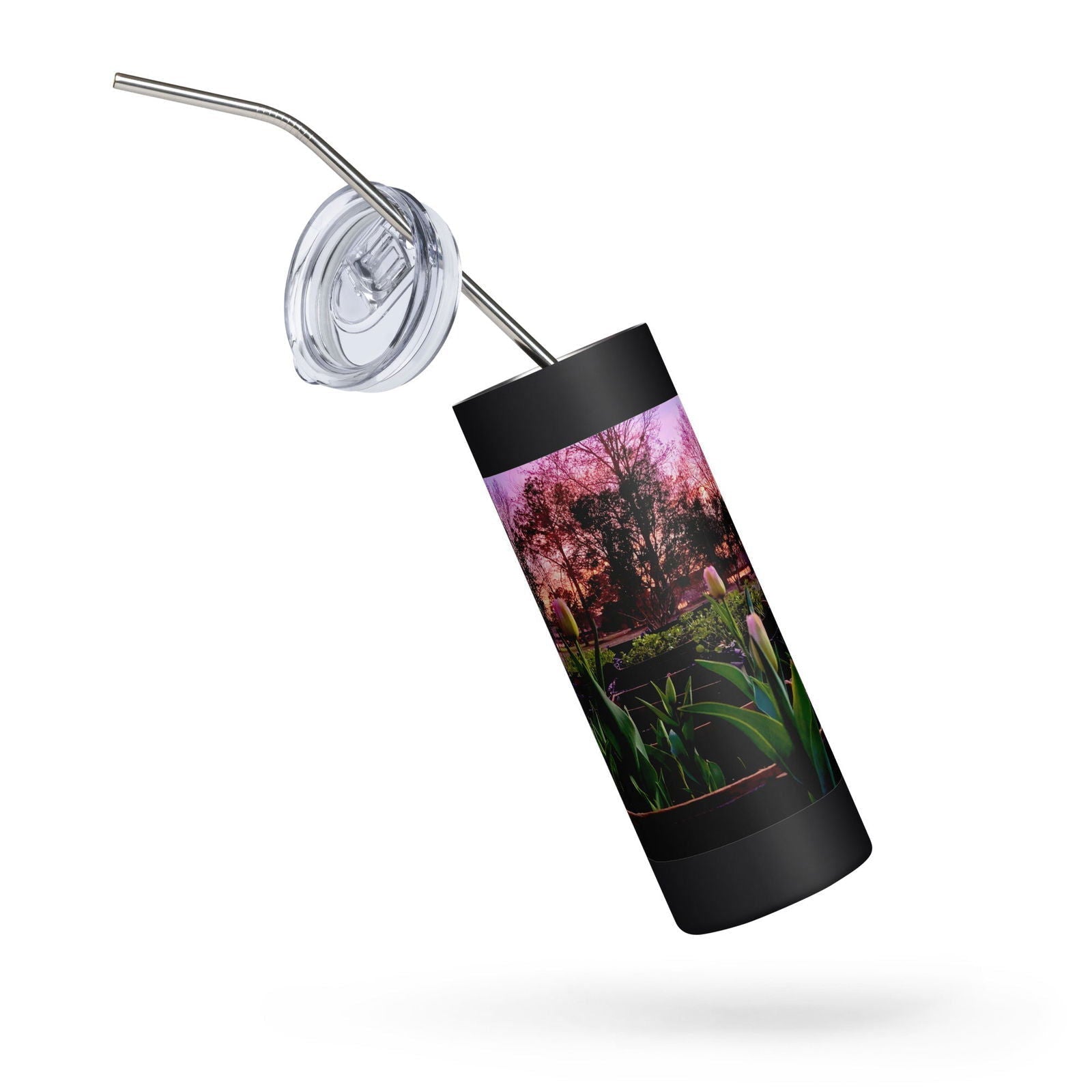 Stainless steel tumbler featuring Blessings Grow Meadows' Tulips at Dusk original artwork, with a floral tulip design on a sleek surface.