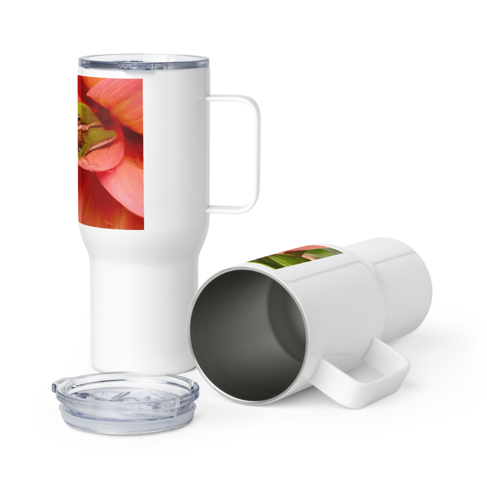 Felling Froggy travel mug with handle, Blessings Grow Meadows houseware, featuring a whimsical frog design in a photography style.
