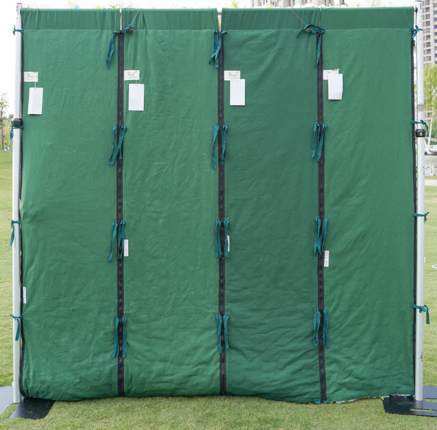 Artificial pink flower wall by Blessings Grow Meadows, 8x8 or 4x4 fabric and silk roses with zip-up curtain for event rentals.