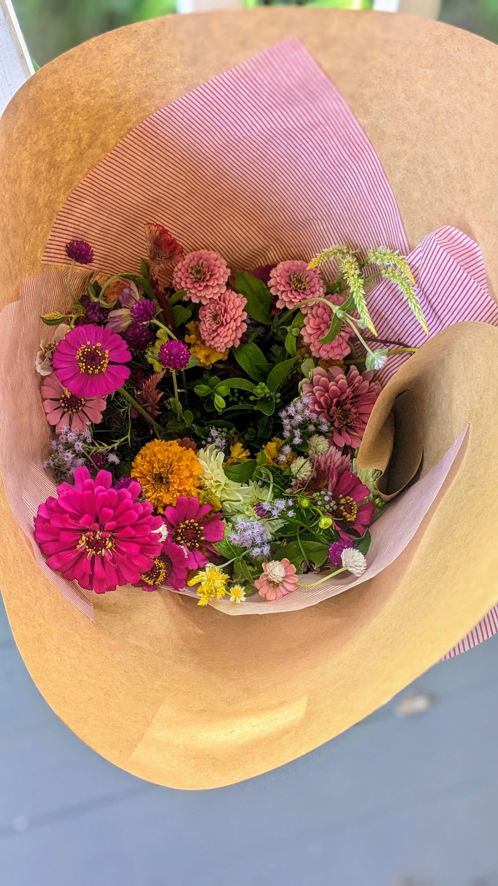Multicolor DIY event flowers and fresh greenery in bloom buckets from Blessings Grow Meadows for bulk floral arrangements.
