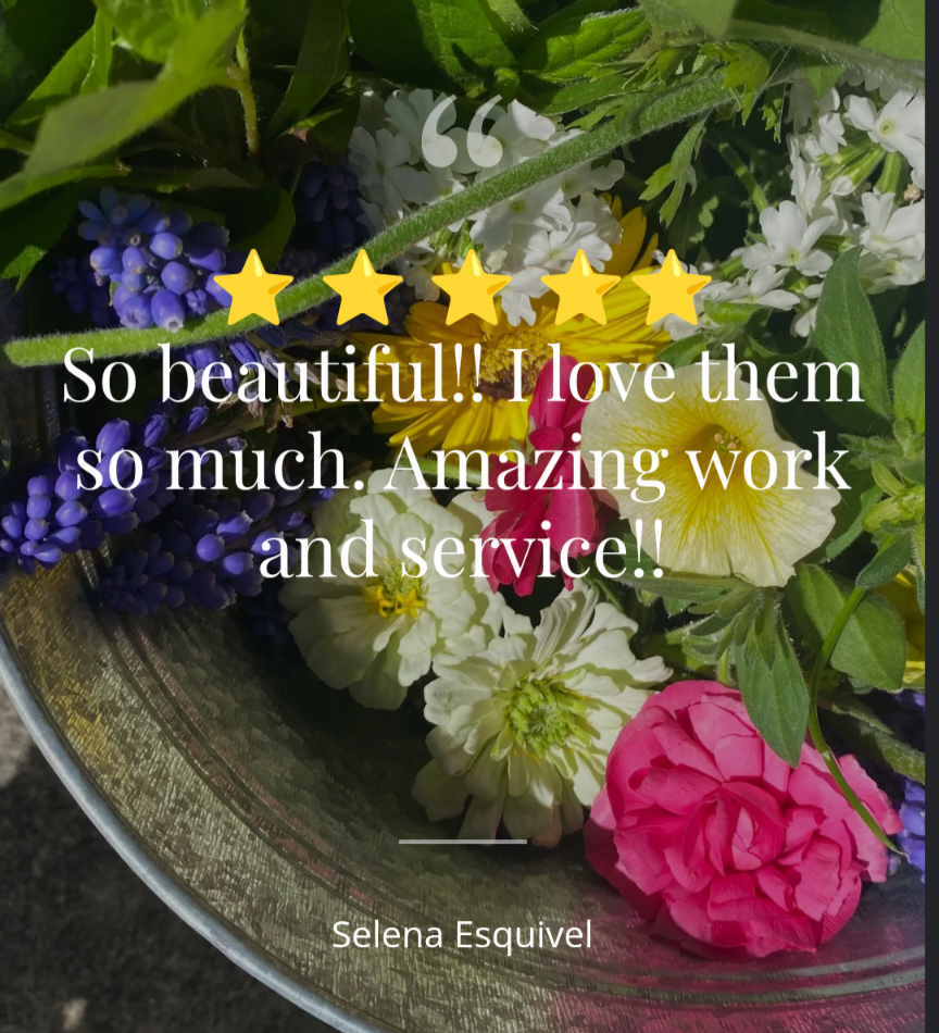 Colorful DIY event flowers and fresh greenery in bloom buckets from Blessings Grow Meadows for bulk floral arrangements.
