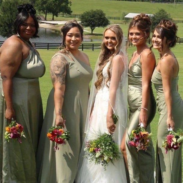 Colorful DIY event flowers and fresh greenery in bloom buckets from Blessings Grow Meadows for bulk floral arrangements.