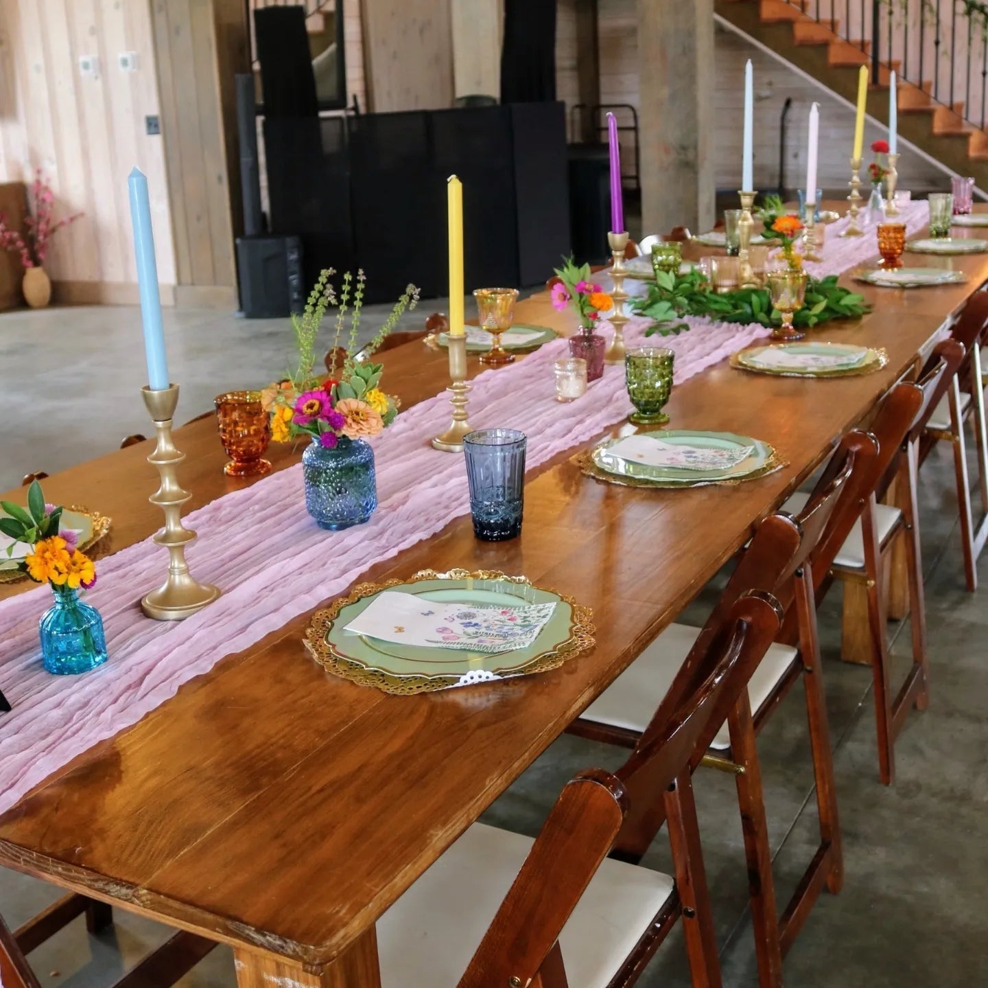 Colorful DIY event flowers and fresh greenery in bloom buckets from Blessings Grow Meadows for easy flower arrangements.