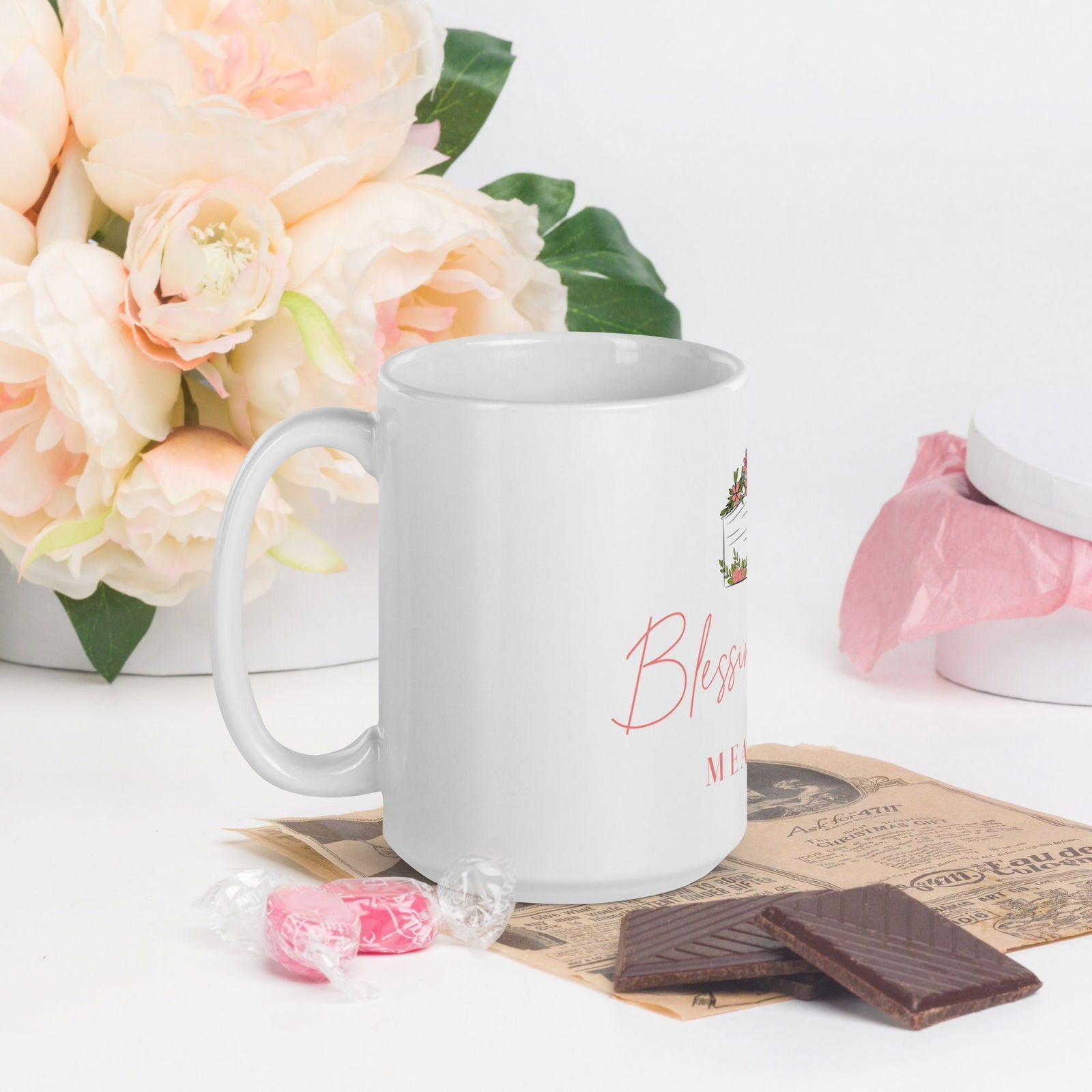 White glossy Blessings Grow Meadows mug with a smooth finish and printed design, perfect for enjoying your favorite beverage.