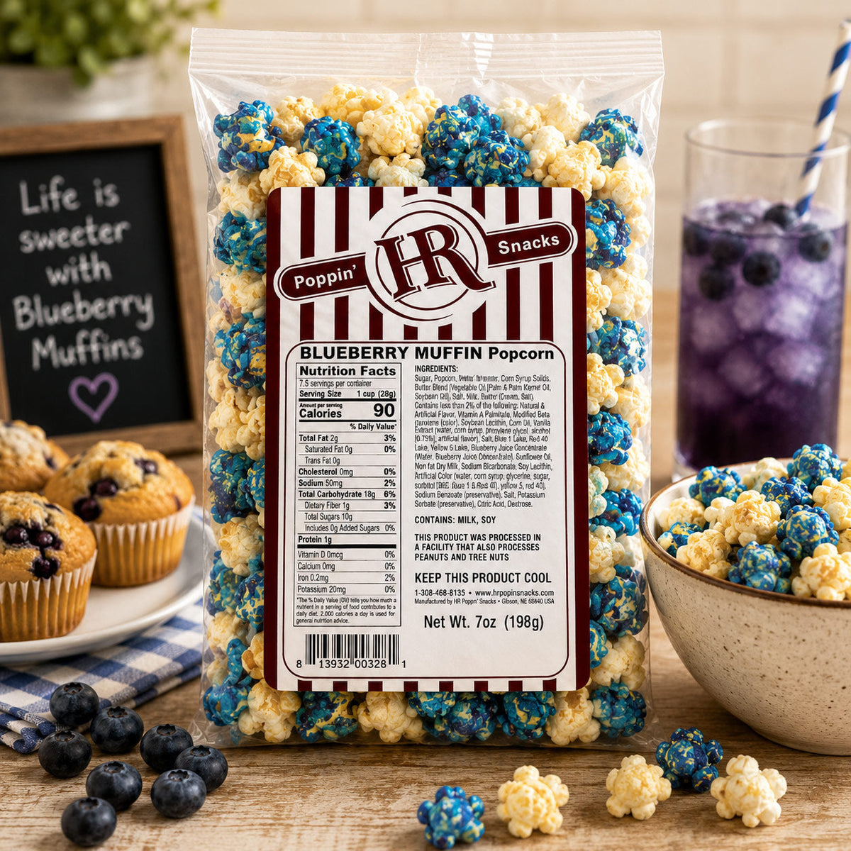 Blueberry muffin popcorn in an 8 oz bag from HR Poppin' Snacks, featuring blue and purple popcorn with blueberry muffin flavor.