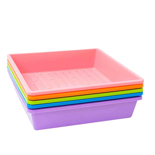 Black Bootstrap Farmer 1010 Trays with holes, 2.5-inch depth, extra strength, suitable for seed starting and propagation.