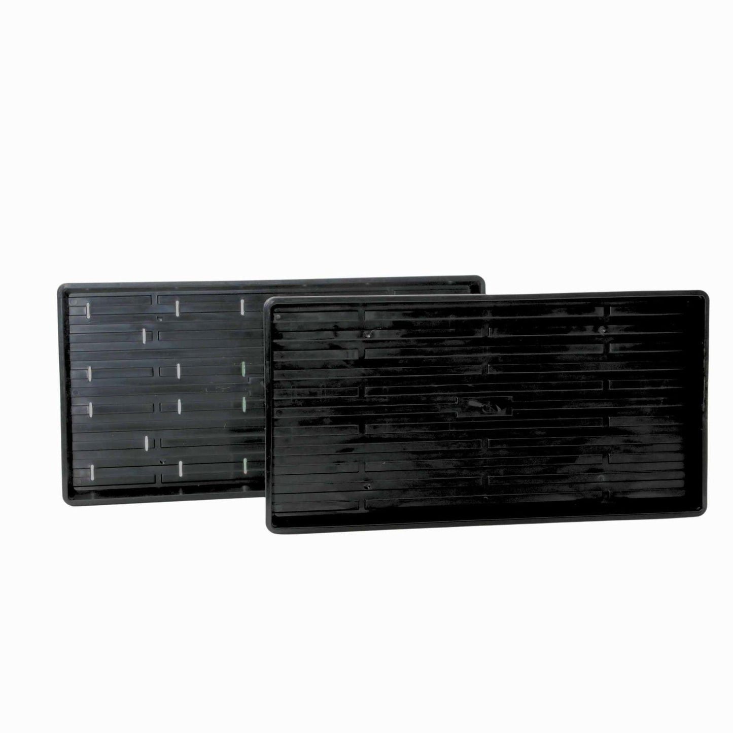 Black Bootstrap Farmer 1020 Microgreen Trays with shallow, extra strength design, perfect for starting microgreens in a professional setting.