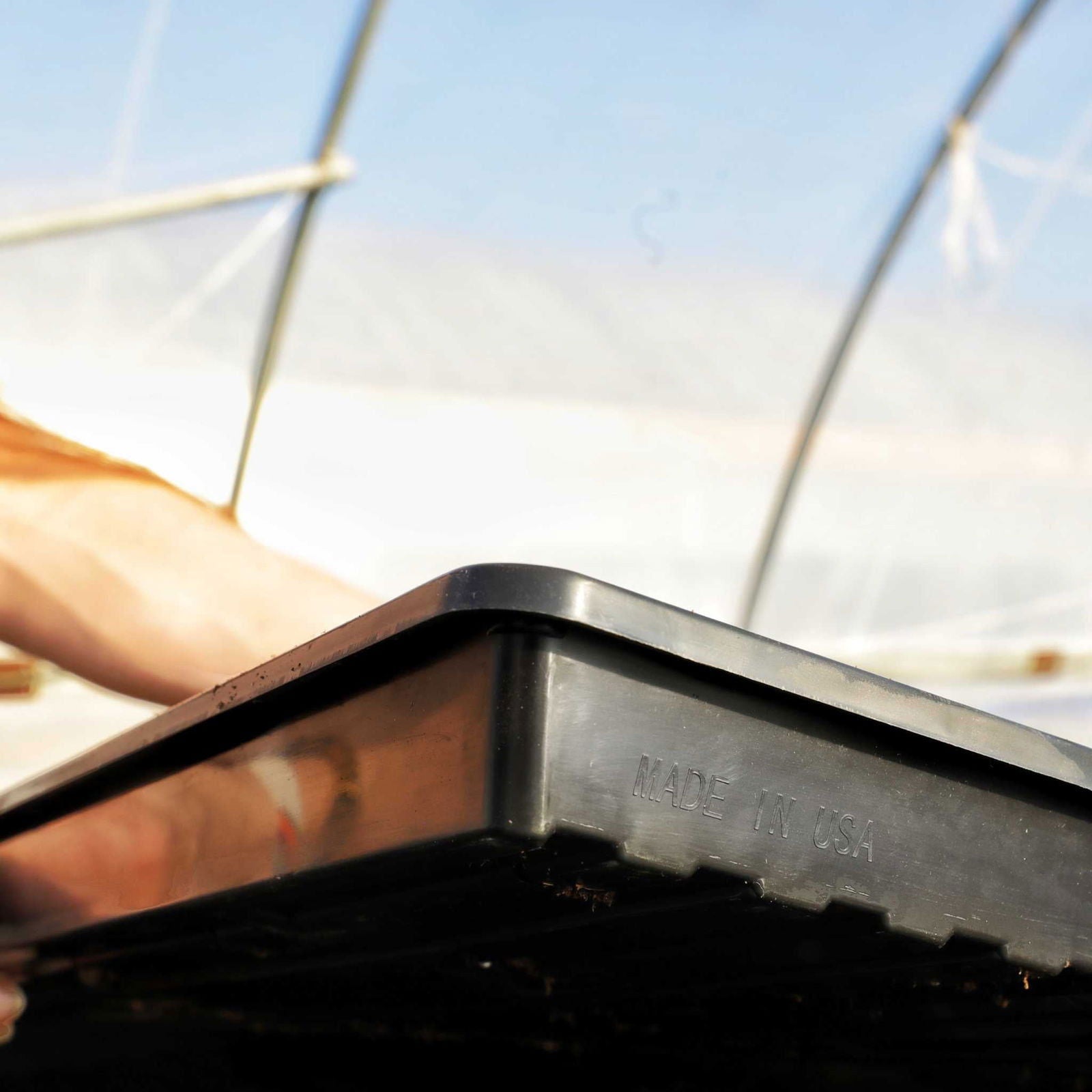 Black Bootstrap Farmer 1020 Microgreen Tray with shallow, extra strength, no holes, designed for small-scale microgreen growing.