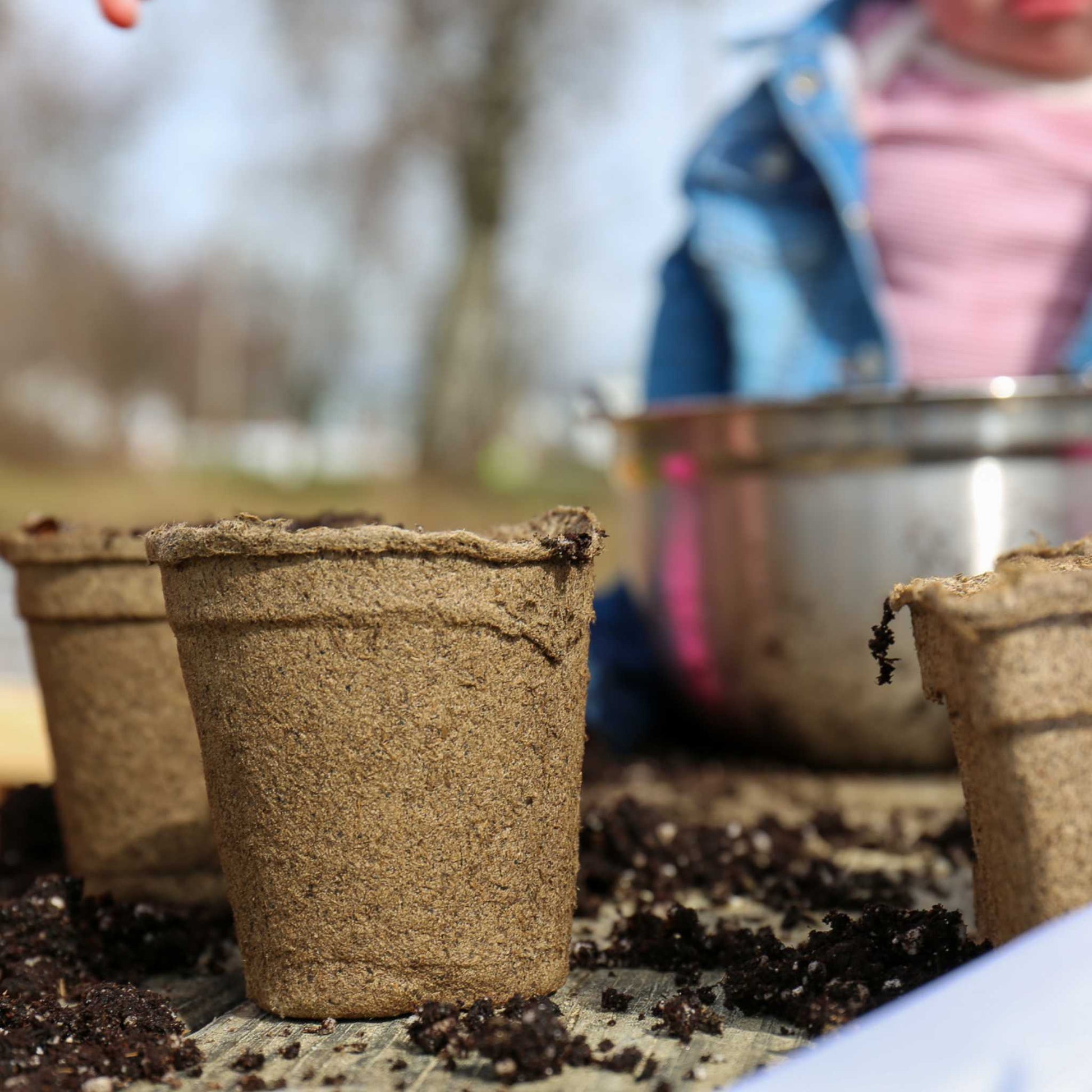 Bootstrap Farmer CowPots® #3 Round biodegradable planting pots arranged in a stack, ideal for seedlings and gardening.