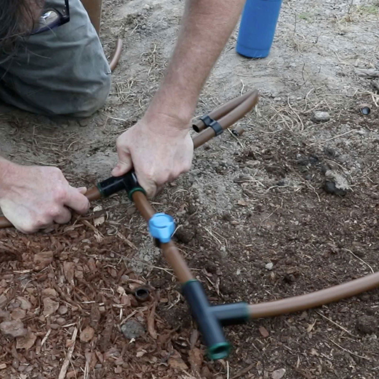 Bootstrap Farmer greenhouse drip irrigation kit with four rows of drip lines and connectors for efficient watering.