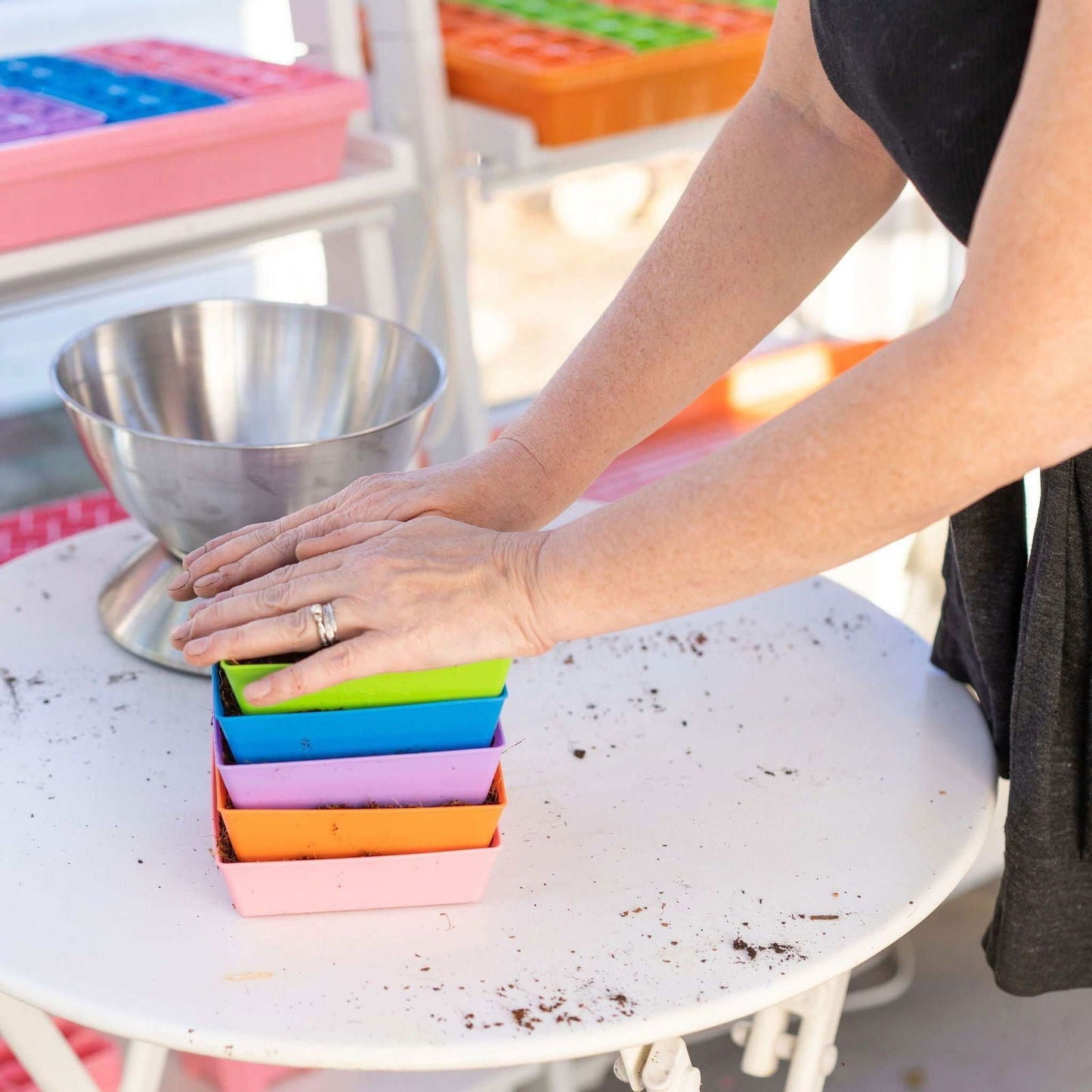 Colorful Bootstrap Farmer 5x5 shallow microgreen trays with 16 inserts, no holes, ideal for microgreen growing.