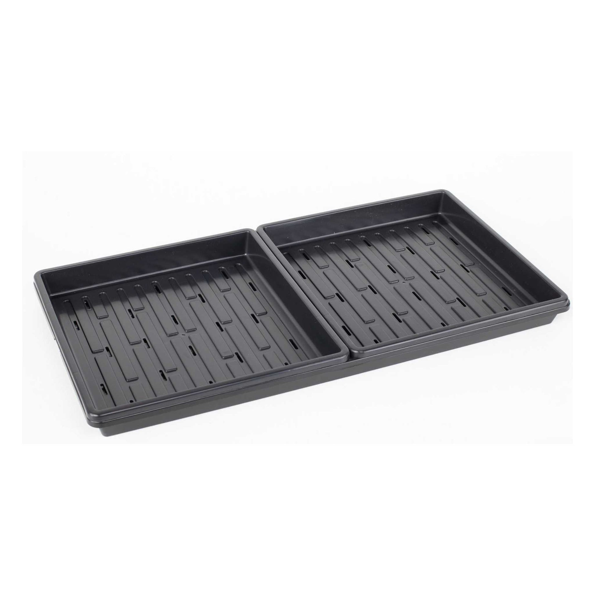 Bootstrap Farmer 1010 Microgreens Kit with black tray and LED grow light for indoor microgreens cultivation.