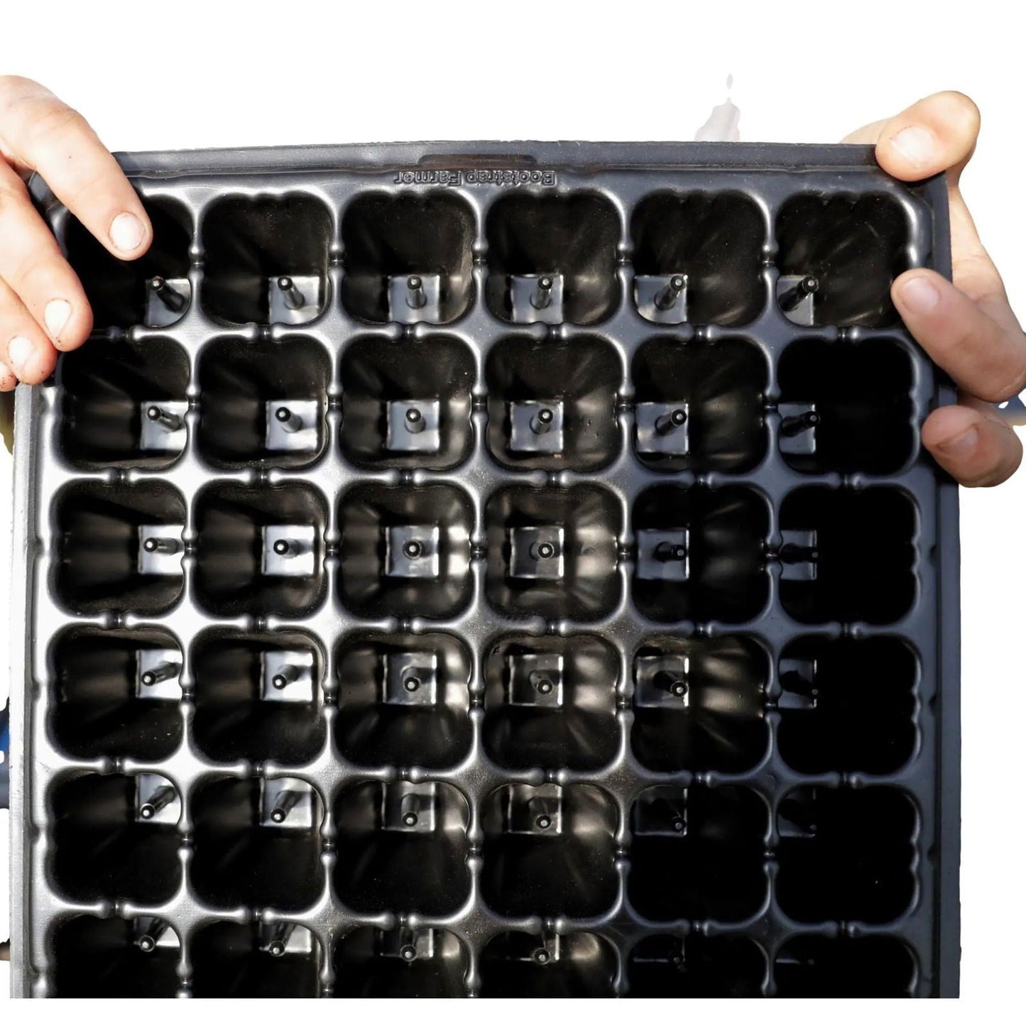 Bootstrap Farmer plug popper tool for 72-cell plant trays, used to easily remove plugs from cell trays.