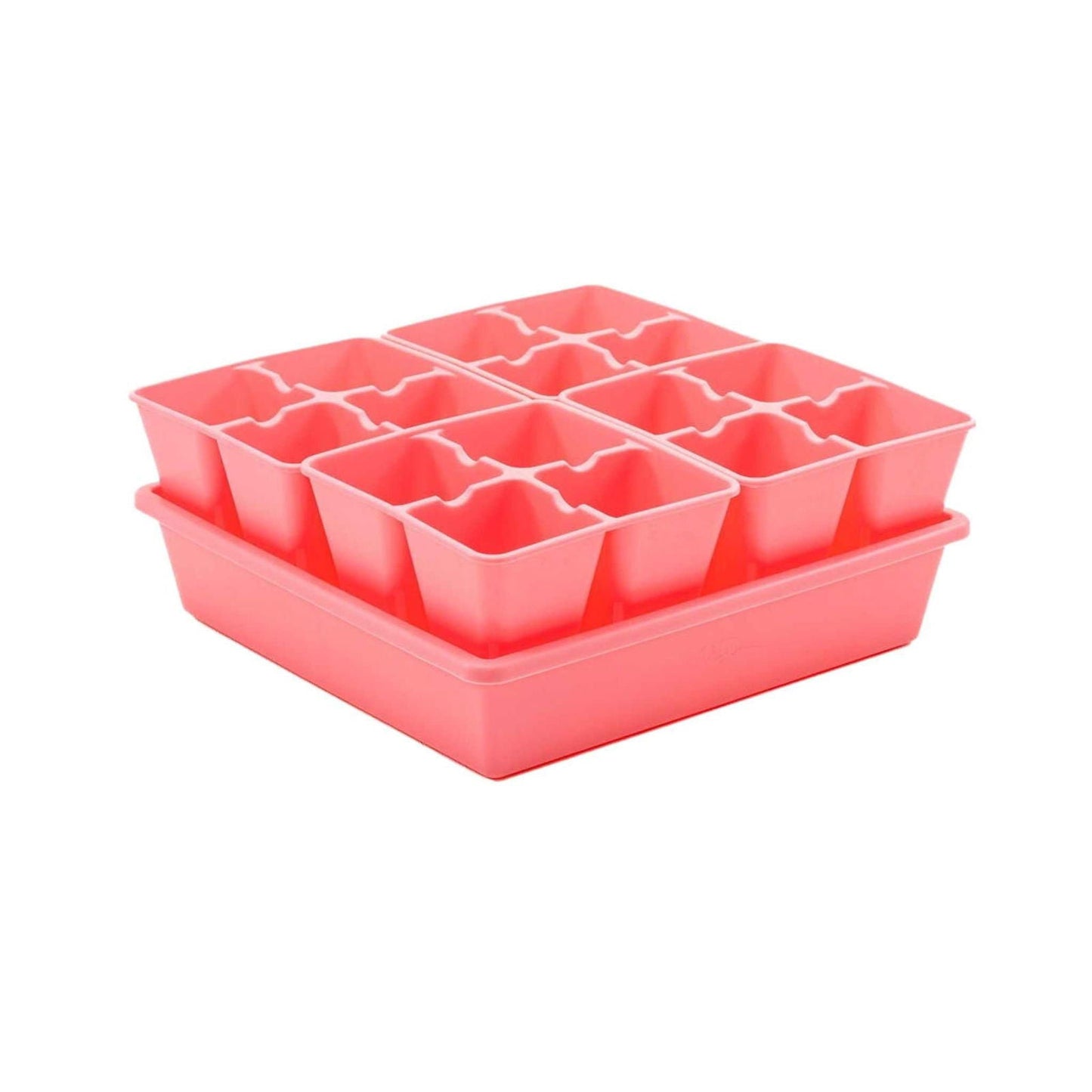 Multicolor Bootstrap Farmer 4 Cell Plug Tray Inserts for seed starting and plant propagation.