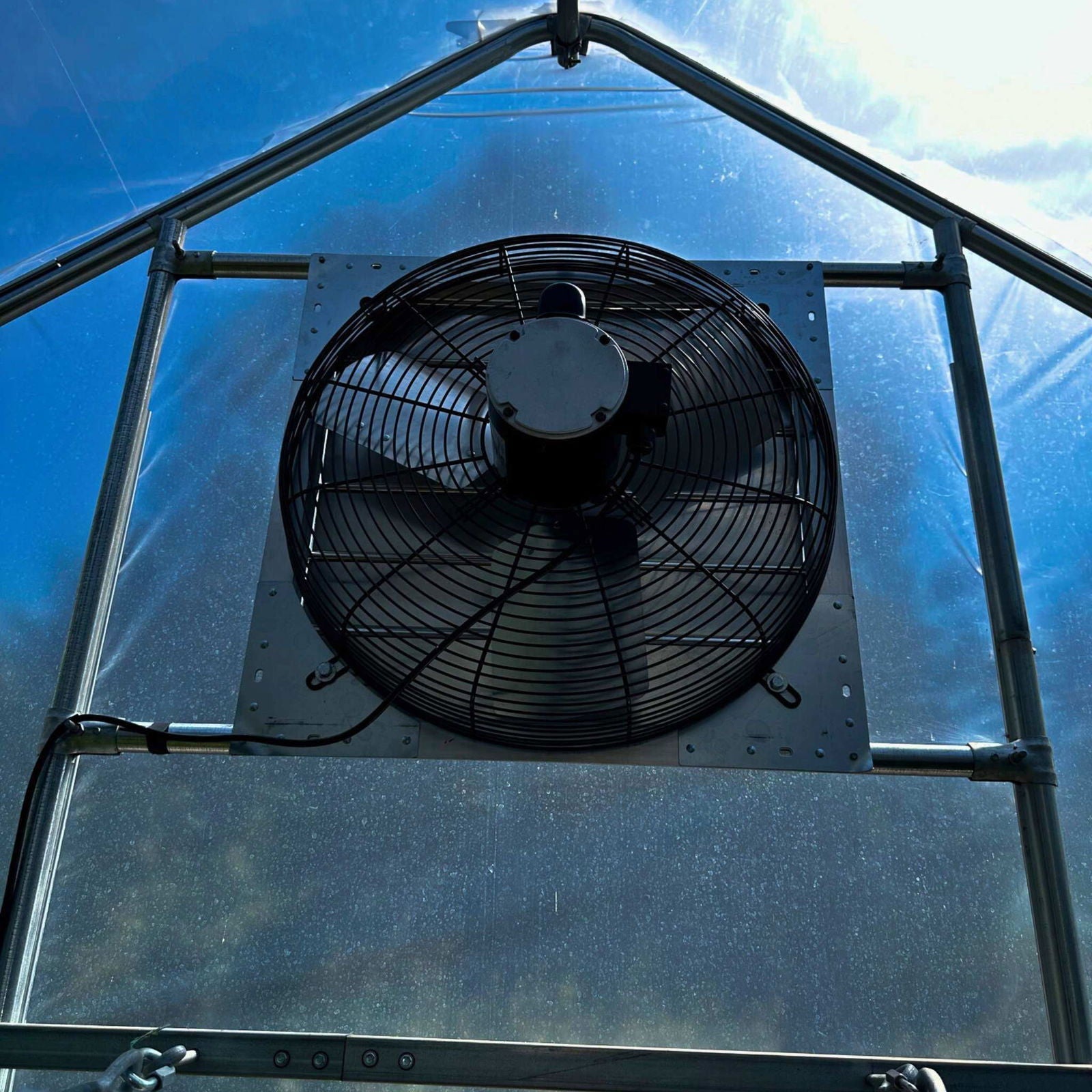 Bootstrap Farmer greenhouse shutter mount exhaust fans, green metal fans with adjustable shutters for ventilation.