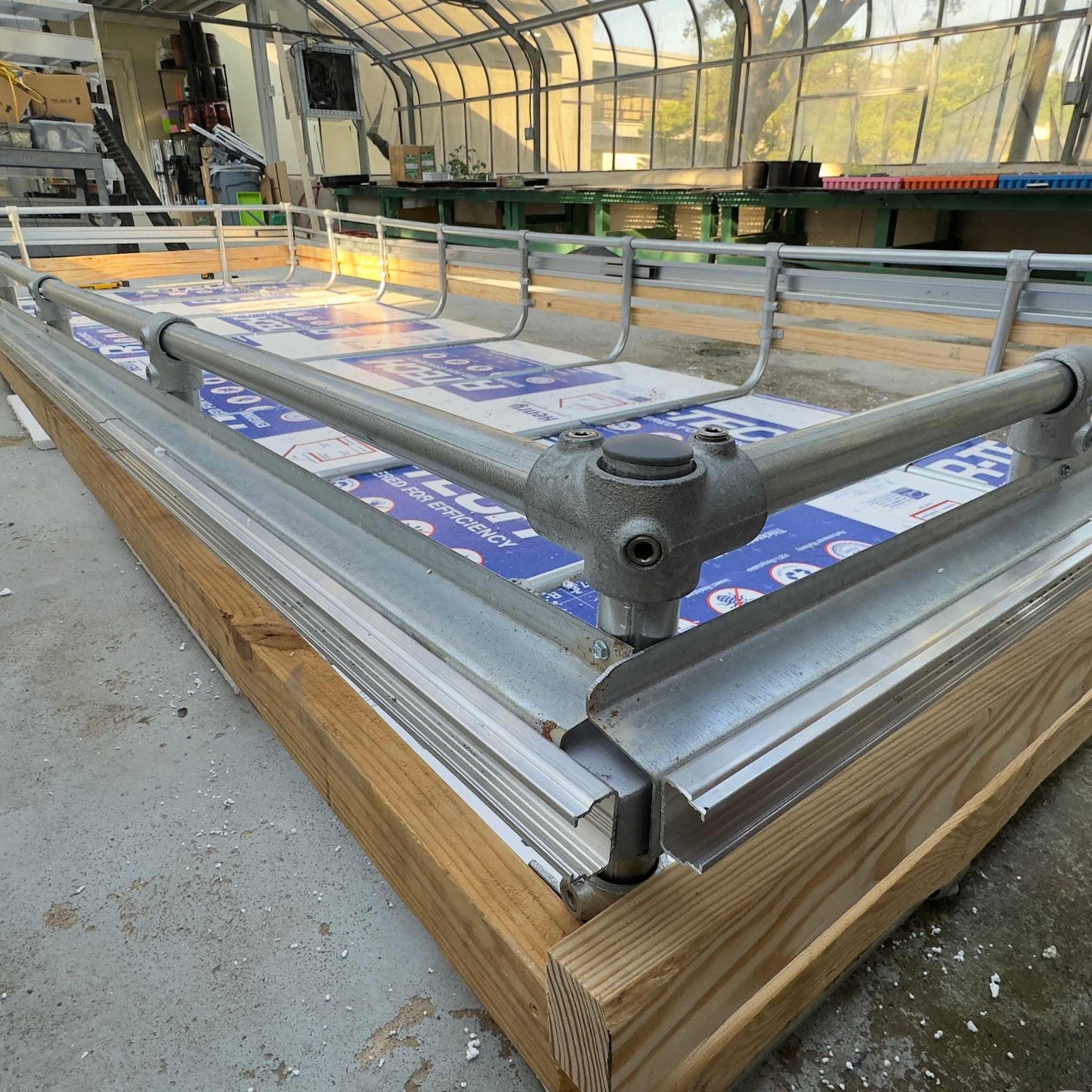 Bootstrap Farmer Deep Water Culture (DWC) kit for hydroponic gardening, featuring garden tools in a compact setup.