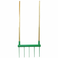 Bootstrap Farmer Broadfork garden tool made in the USA, with sturdy tines and ergonomic handle for easy soil cultivation.