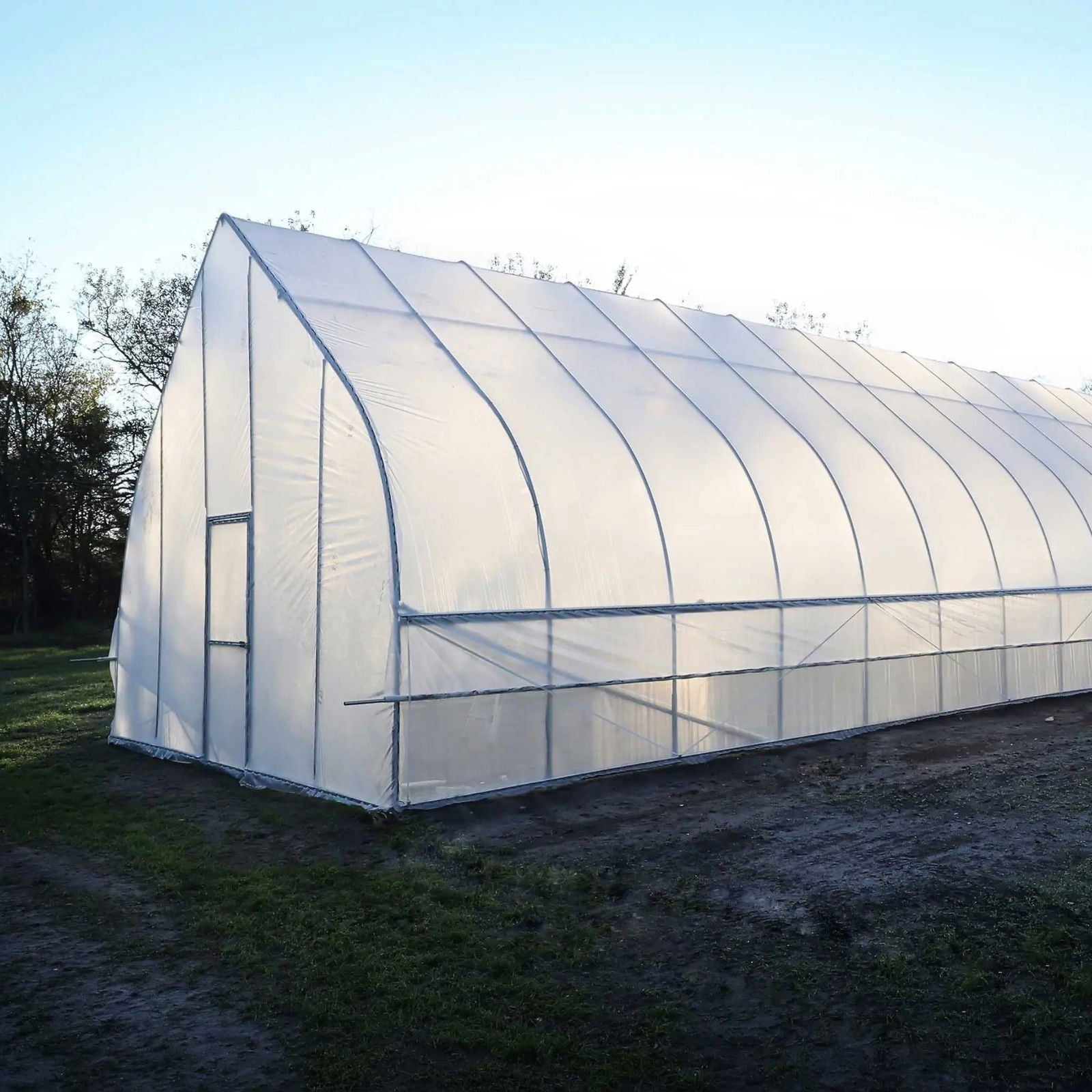 Gothic All-Metal Hoop House Kit by Bootstrap Farmer, a durable greenhouse kit with sturdy metal arches for gardening.
