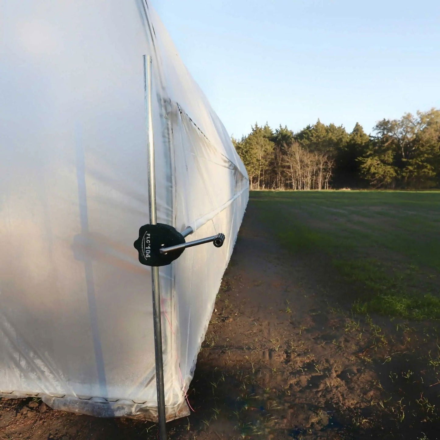 Gothic all-metal hoop house kit for greenhouse gardening by Bootstrap Farmer, featuring sturdy metal frame and transparent covering.