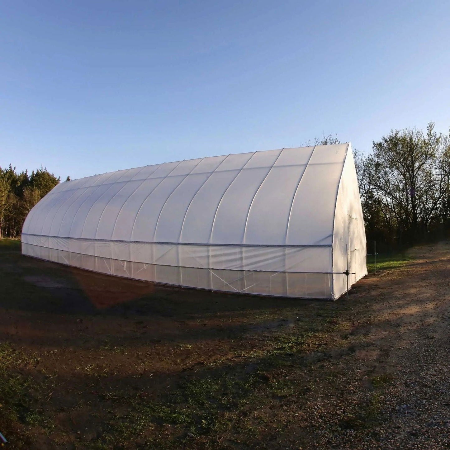 Gothic All-Metal Hoop House Kit from Bootstrap Farmer, a durable greenhouse kit with sturdy metal arches for plant protection.