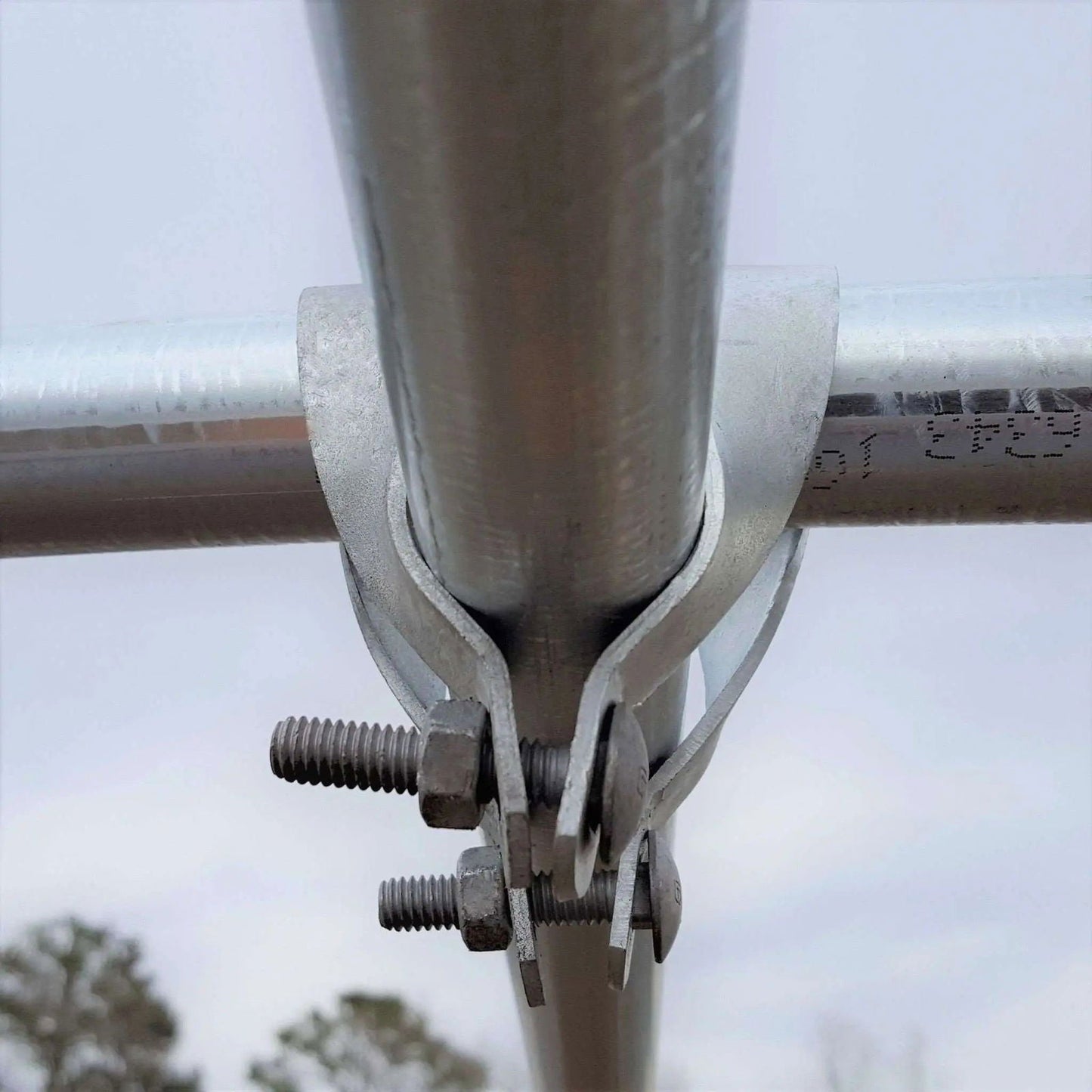 Galvanized steel greenhouse cross connectors by Bootstrap Farmer, 1 3/8-inch size, used for sturdy greenhouse structure connections.