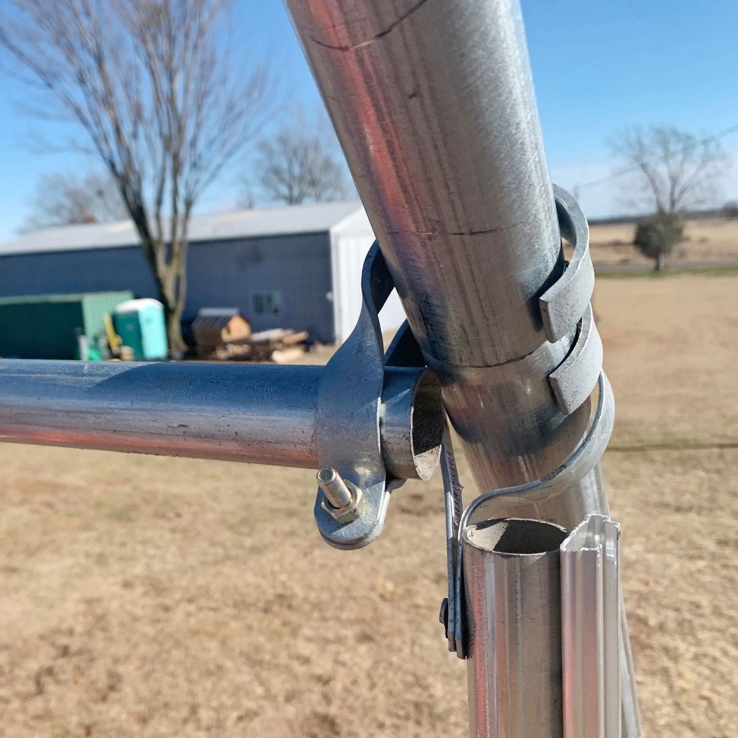Bootstrap Farmer end wall cross connector for greenhouse, 1.900 x 1.35, green metal part for structural support.