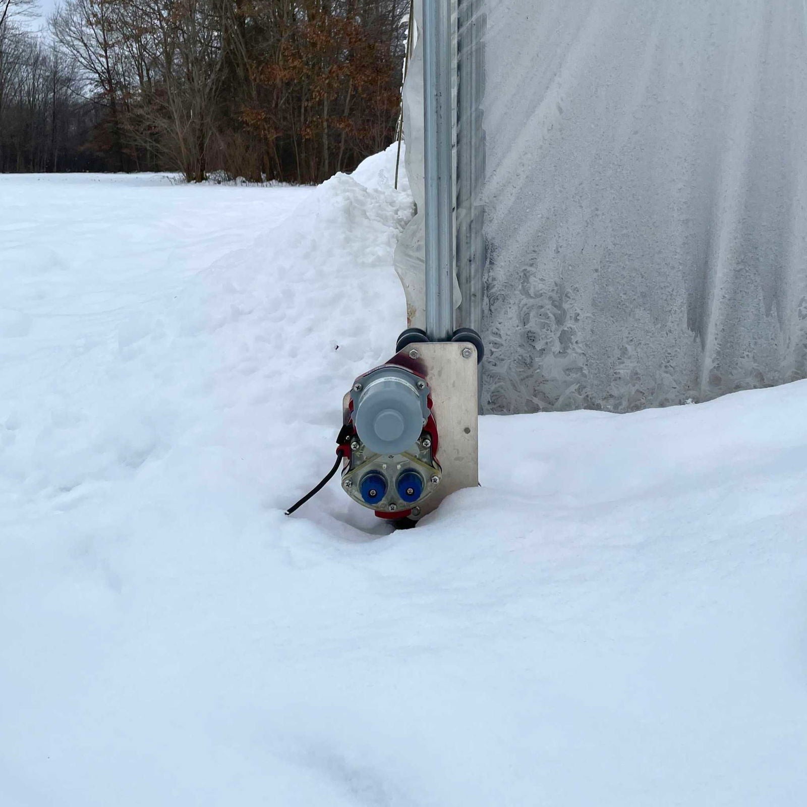 Bootstrap Farmer automated roll-up sides motor for greenhouse, compatible with manual roll-up side systems for easy automation.