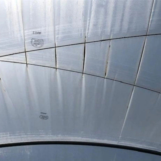 Bootstrap Farmer high diffusion 6 mil open UV greenhouse plastic, durable and lightweight for effective plant growth.