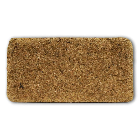 Bootstrap Farmer coco coir brick used as growing media, showing compressed coconut fiber ready for hydration and planting.