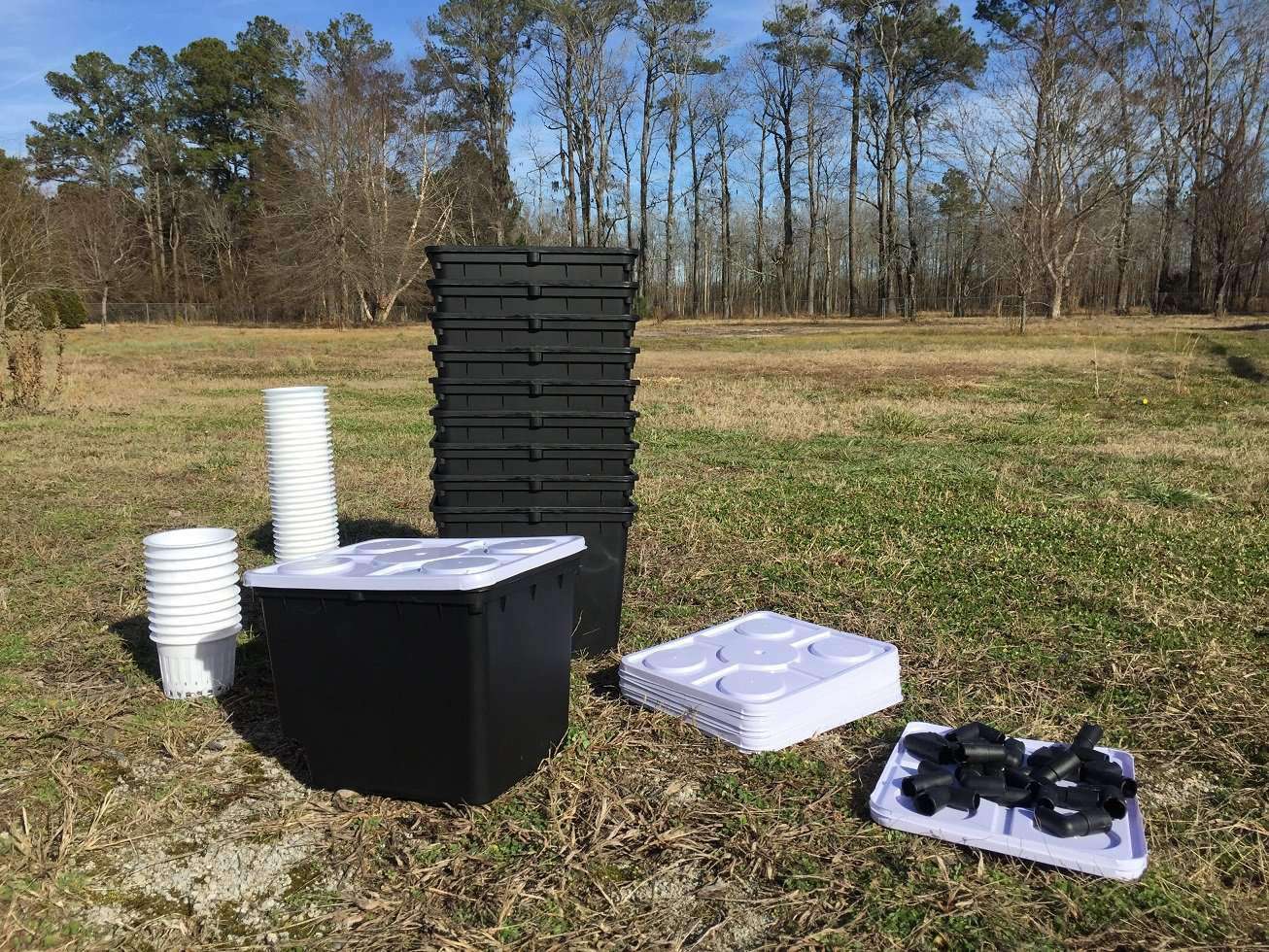 Set of ten Bootstrap Farmer Dutch Bucket Hydroponic Equipment for efficient hydroponic gardening in a professional setup.