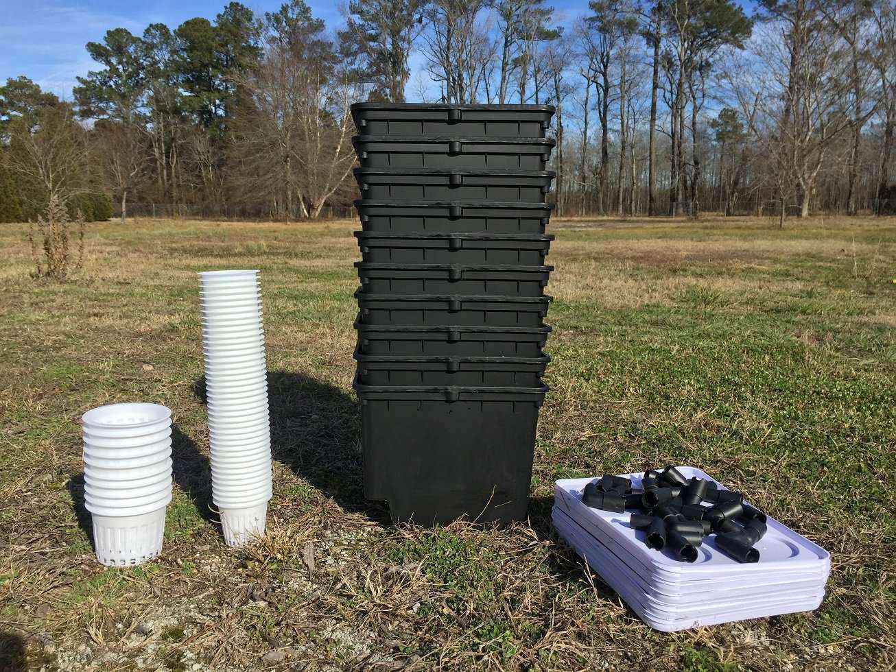 Set of 10 Bootstrap Farmer Dutch Bucket Hydroponics DWH system components for efficient hydroponic gardening.