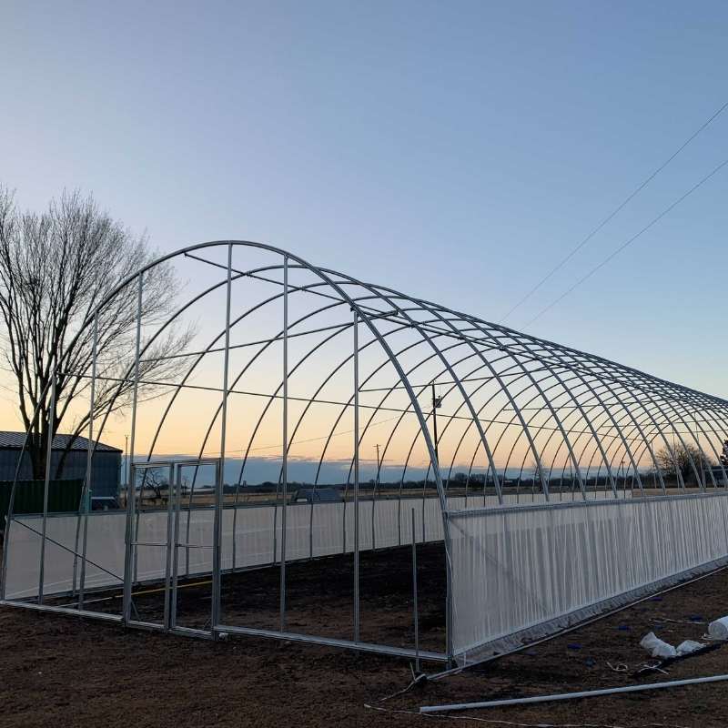 Bootstrap Farmer Sidewall Insect Netting used as insect barrier on greenhouse sidewall for pest protection.