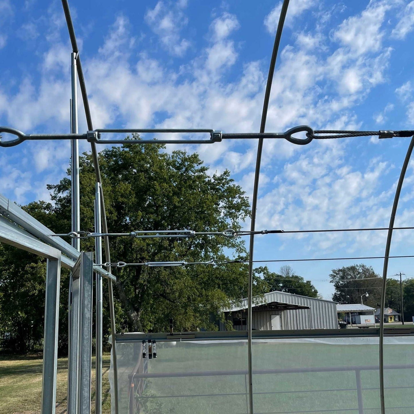 Bootstrap Farmer Complete Trellising System for plant supports, featuring durable metal stakes and support wires.