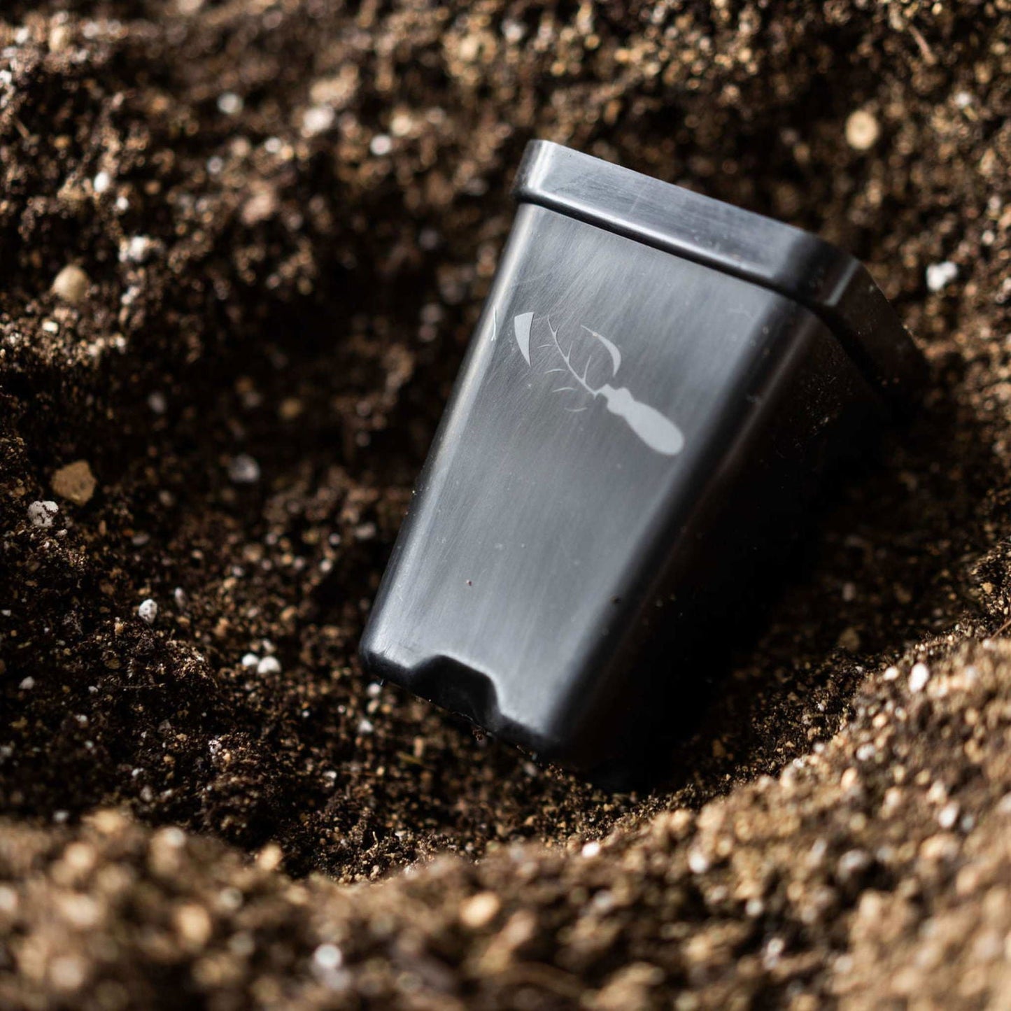 Set of 40 Bootstrap Farmer 2.5-inch extra strength seed starter pots in black, ideal for planting and sprouting seeds.