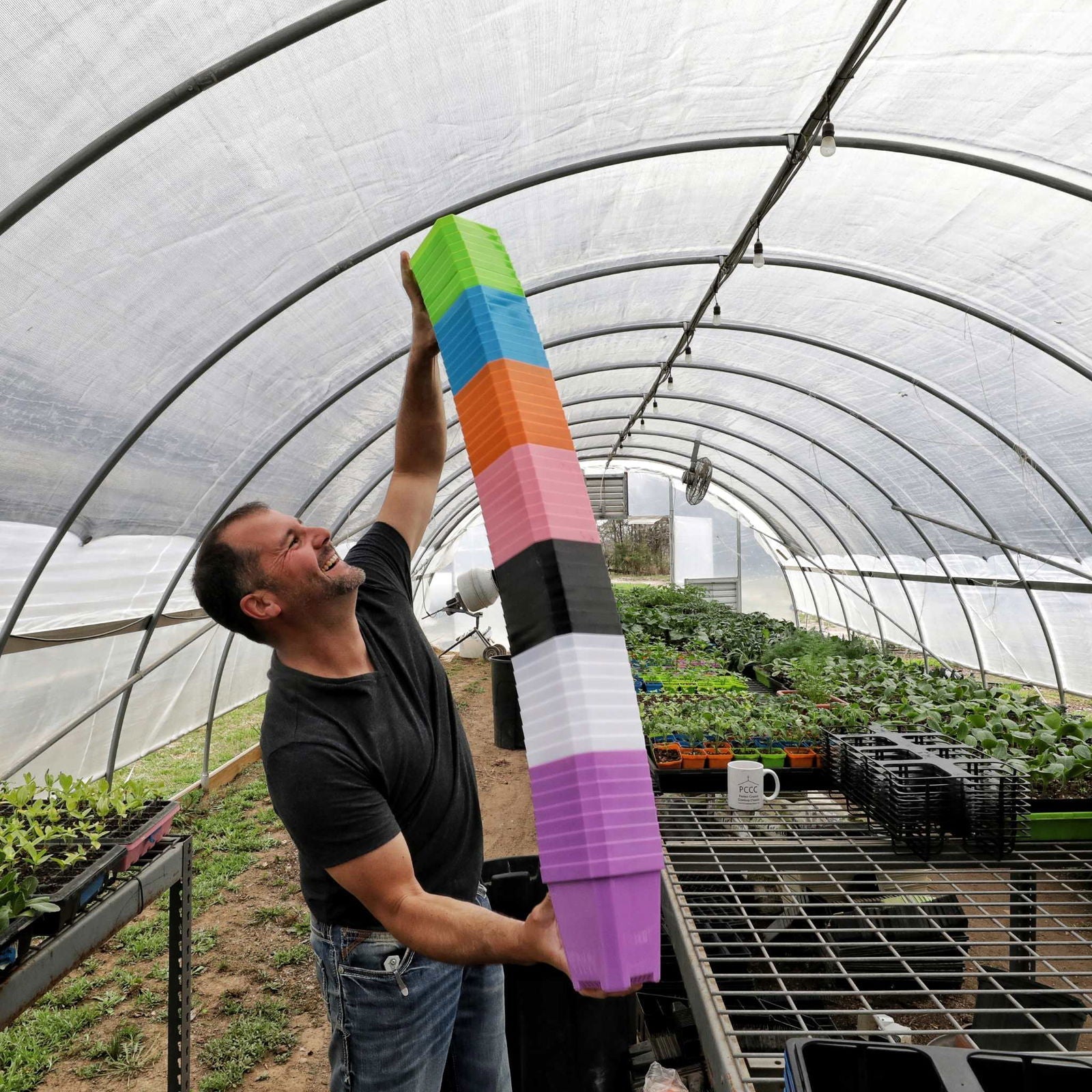 Set of 40 multicolor 5-inch reusable seed starting pots with inserts by Bootstrap Farmer, ideal for transplanting seedlings.
