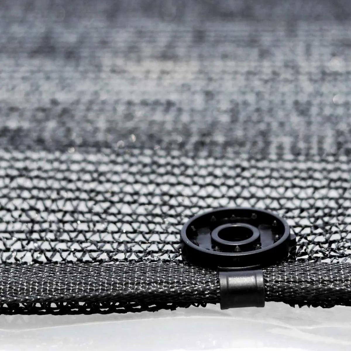Greenhouse shade cloth by Bootstrap Farmer, 30% black shade, durable fabric blocking sunlight for plant protection and temperature control.