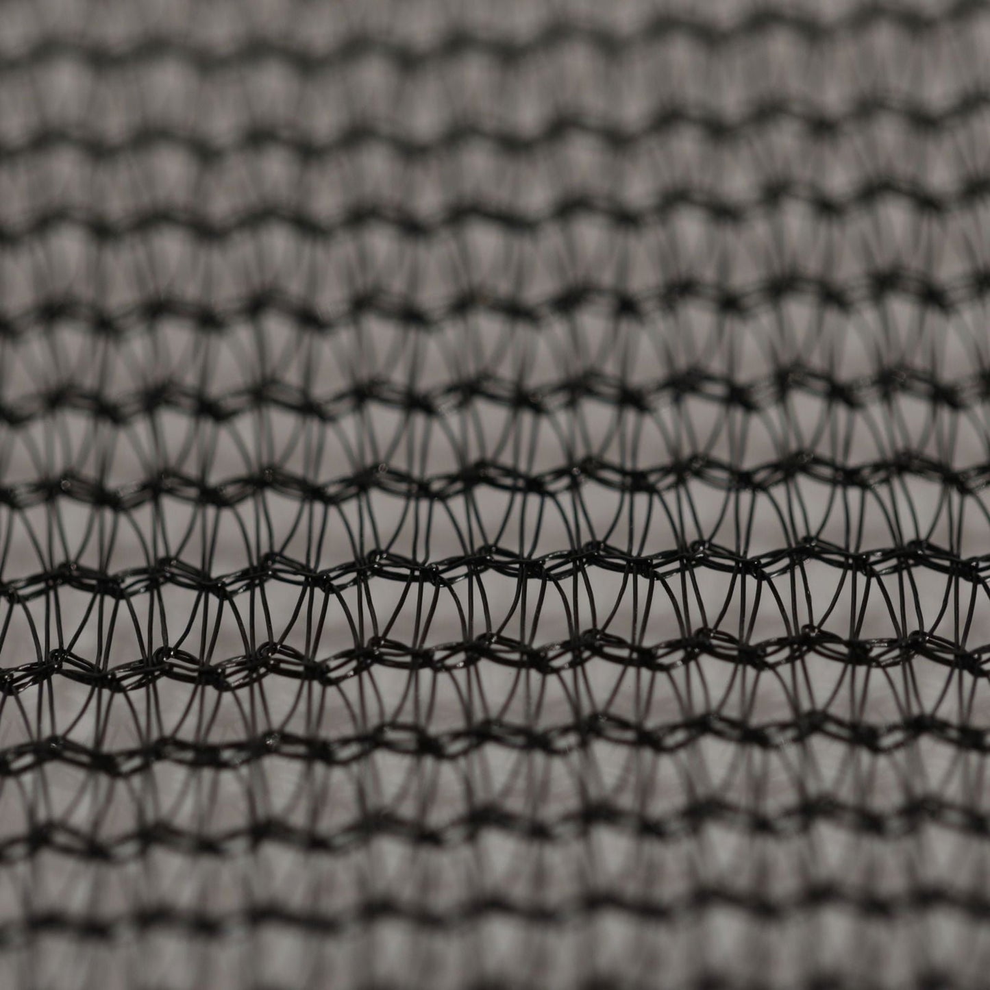 Black Bootstrap Farmer Shade Cloth, 50% shade, extra strength mono filament fabric for outdoor sun protection and gardening.