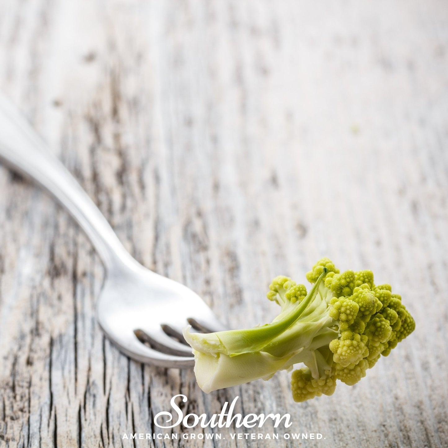 Romanesco broccoli seeds by Southern Seeds, showing vibrant green, spiral-shaped vegetable buds ready for planting.