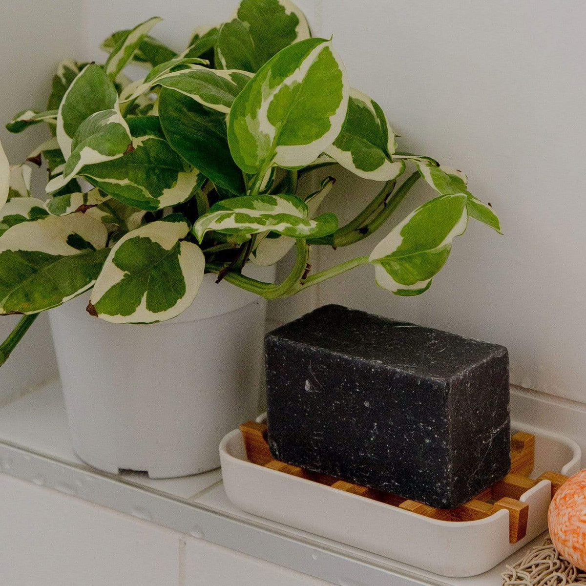Natural bamboo soap dish with drain holes, designed for eco-friendly soap storage, made by ZeroWasteStore.com.