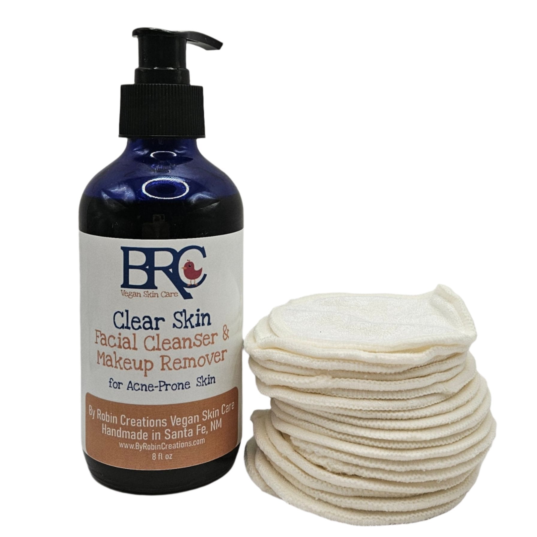 By Robin Creations Clear Skin Facial Cleanser and Makeup Remover Pads for acne-prone skin, shown in washable organic cotton pads and glass pump bottle