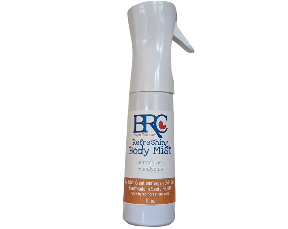 By Robin Creations essential oil body mist in a 3.4 oz glass bottle, featuring winter blend of balsam and pine, TSA compliant.