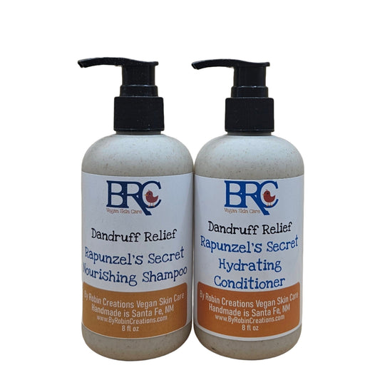 By Robin Creations dandruff relief liquid shampoo and conditioner set in biodegradable pump bottles, showing the bottles and labels.